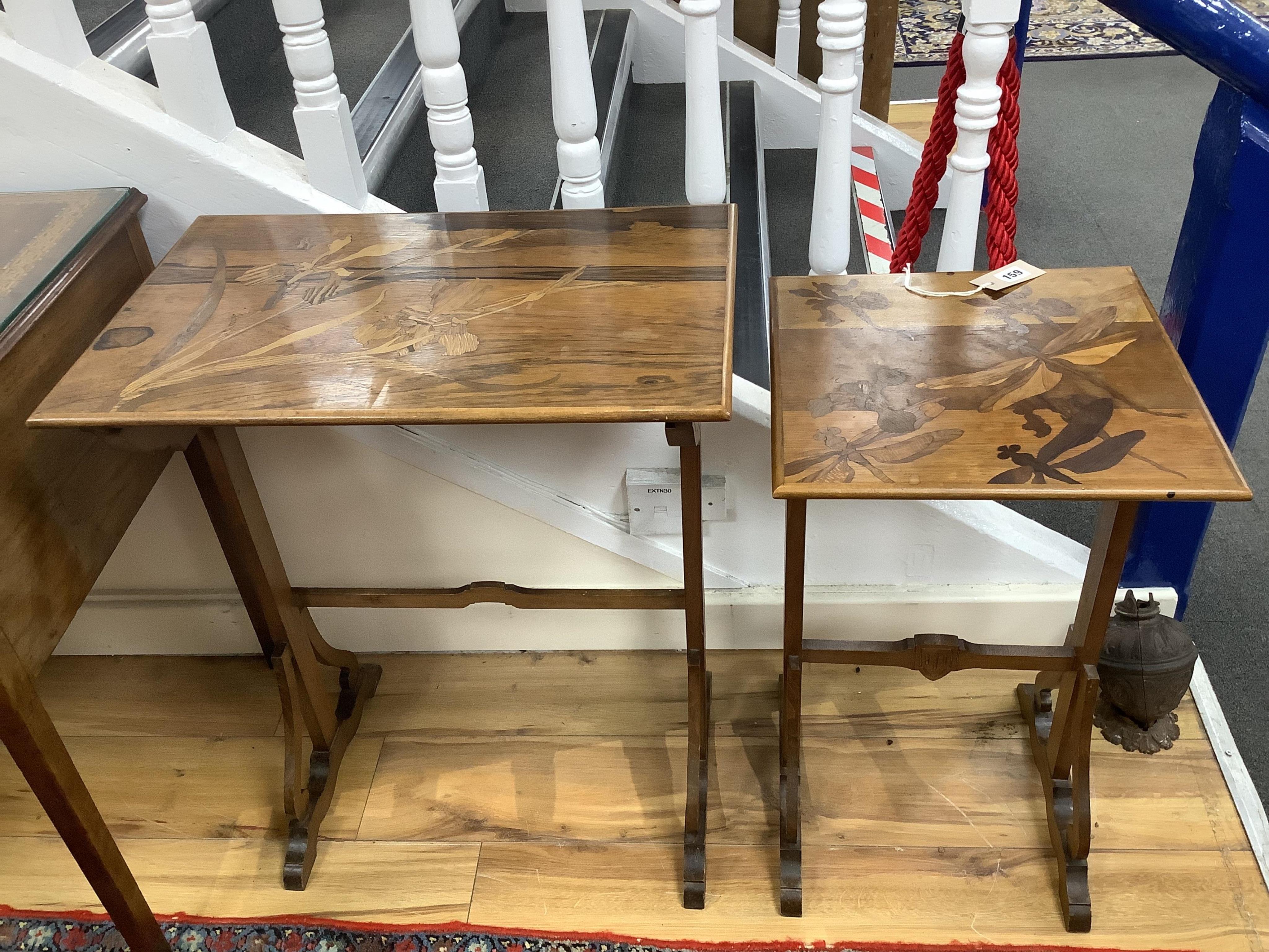 Two from a nest of early 20th century Galle style rosewood and marquetry tea tables, larger width 57cm, depth 38cm, height 70cm. Condition - fair